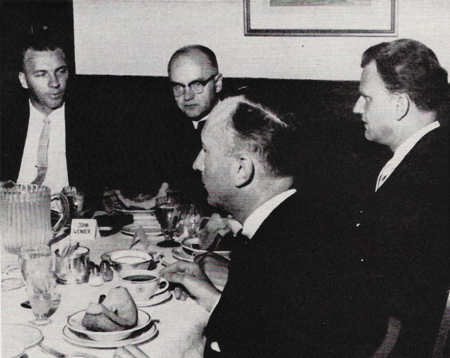 In this photo from the Evangelical Visitor, Billy Graham (third from left) meets with representatives of the Mennonite Church