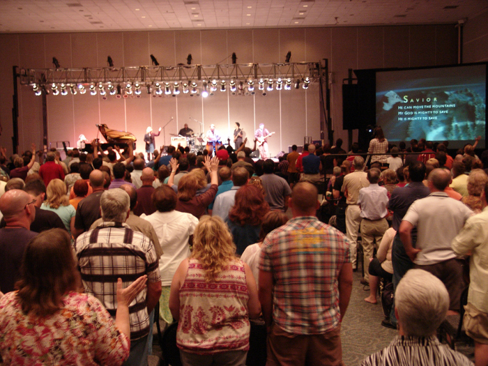 Worship at the Brethren in Christ's 2012 General Conference. Note the worship band and the charismatic expressions such as raised hands (Courtesy of the Brethren in Christ Church U.S.)