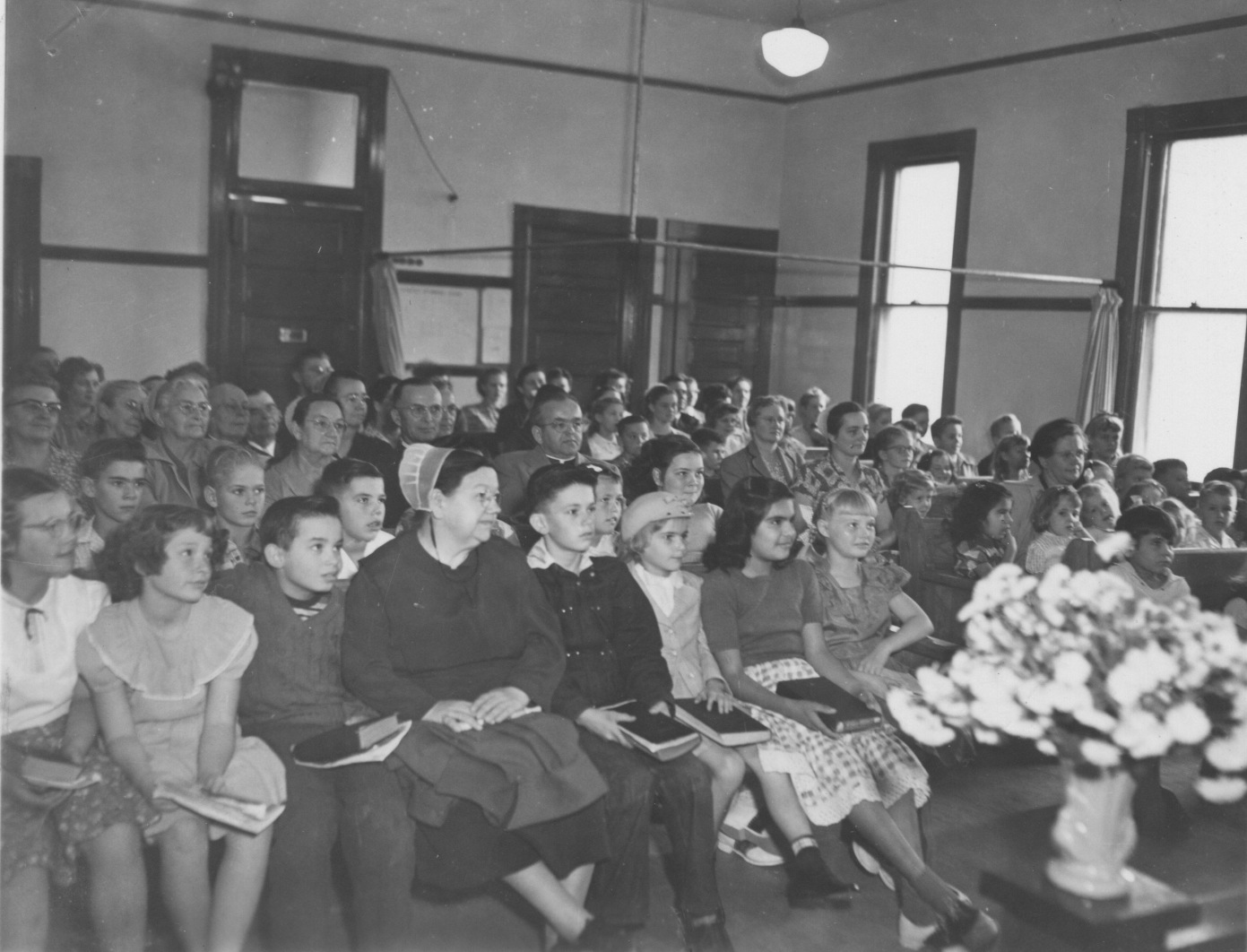 An image of the Chino congregation in the 1920s, shortly after the Brethren in Christ bought the old schoolhouse building (Brethren in Christ Historical Library and Archives)